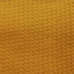 Waffle fabric swatch showing detailed texture and grid pattern.